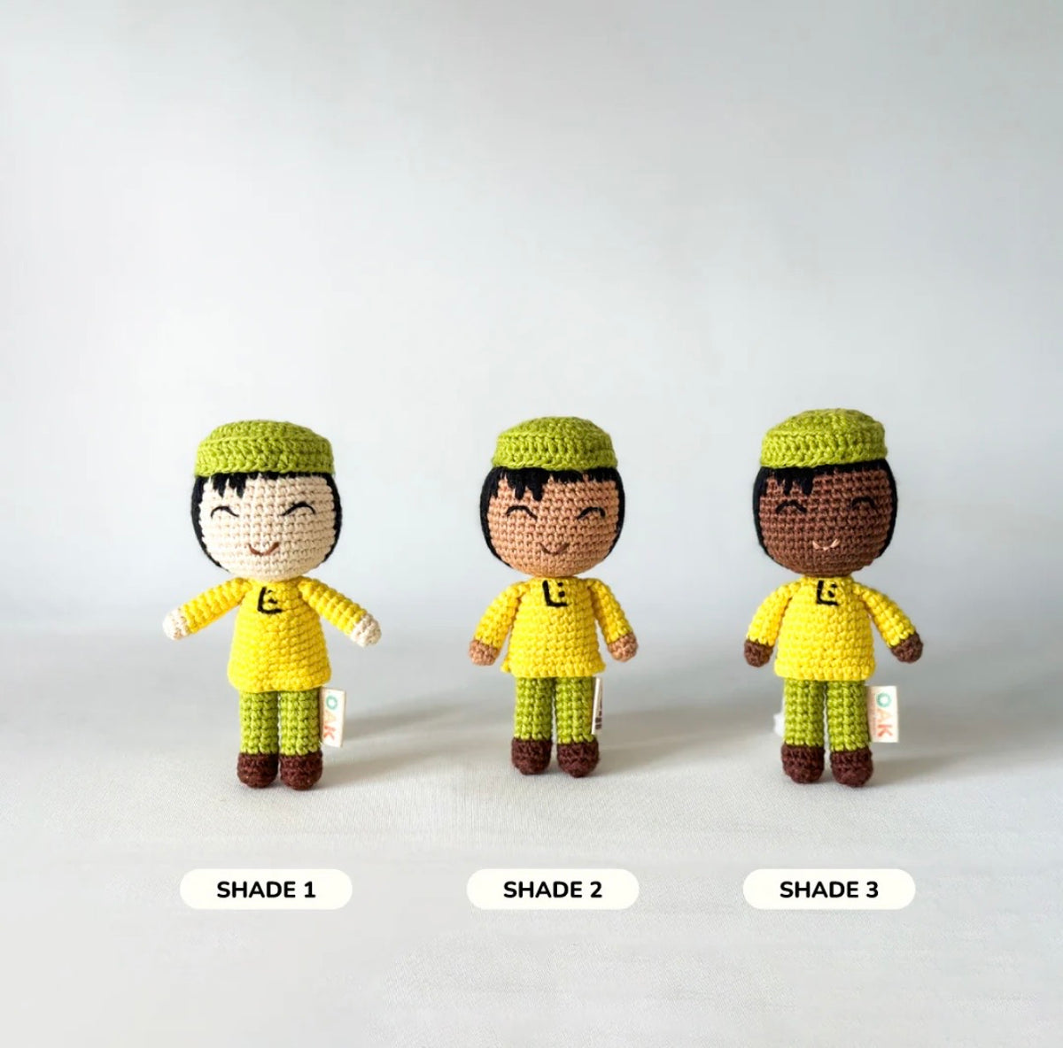 Mini boy doll with yellow and green